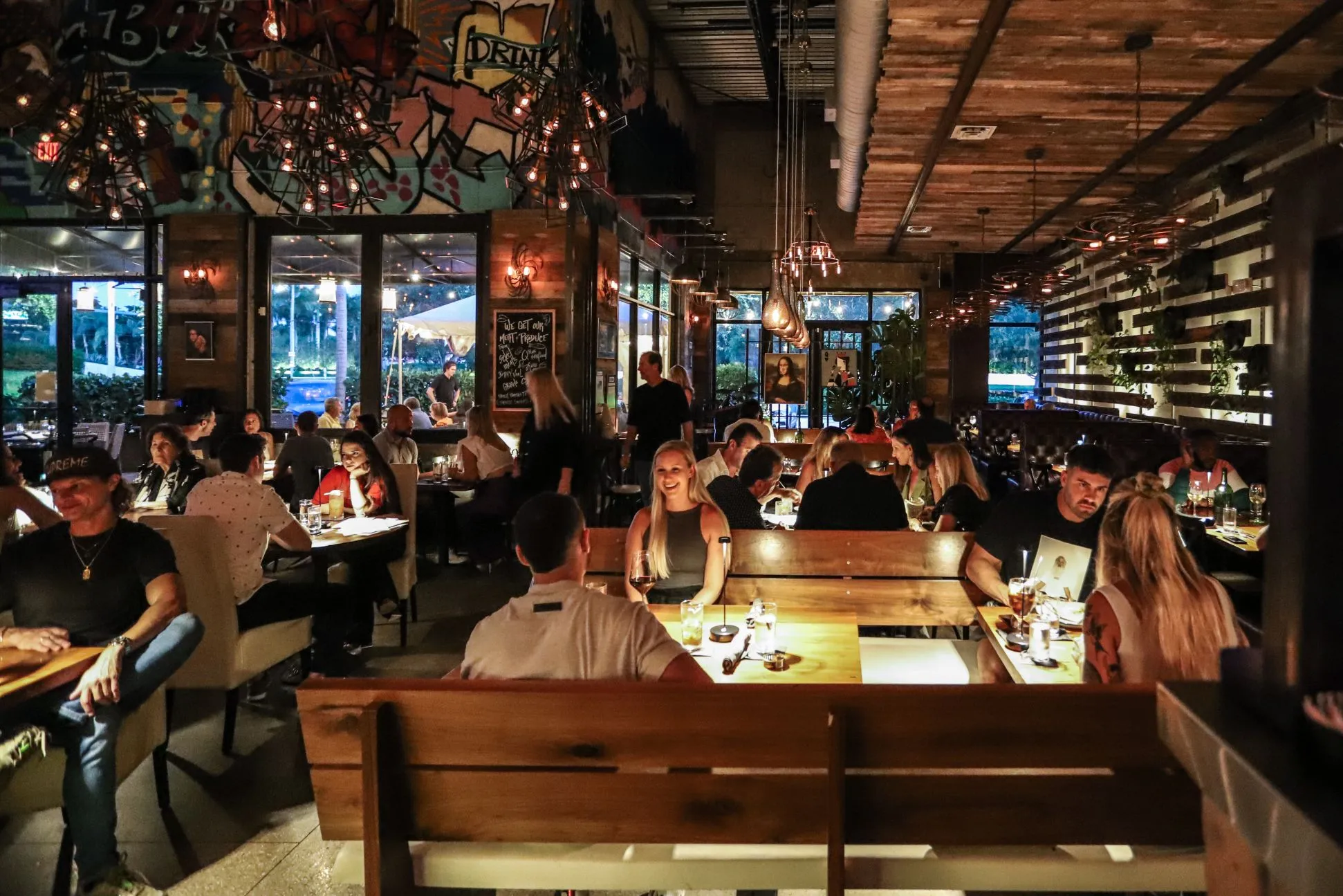 Interior of Mia Kitchen & Bar at Night with Guests